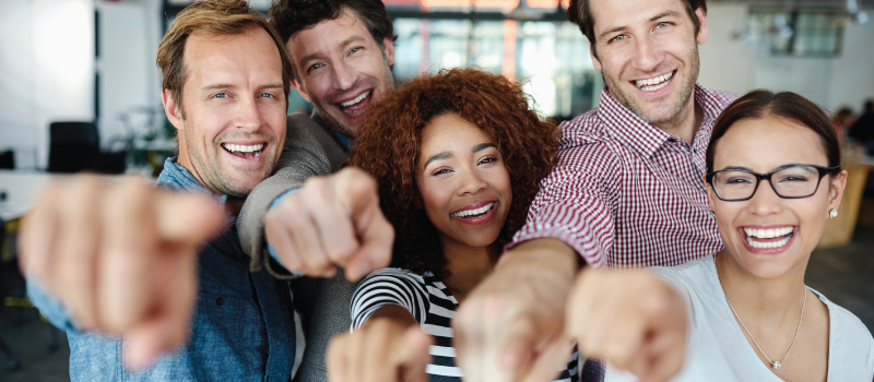 group of people pointing to join
