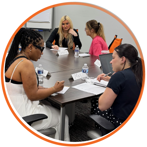 focus group of girls sitting at table