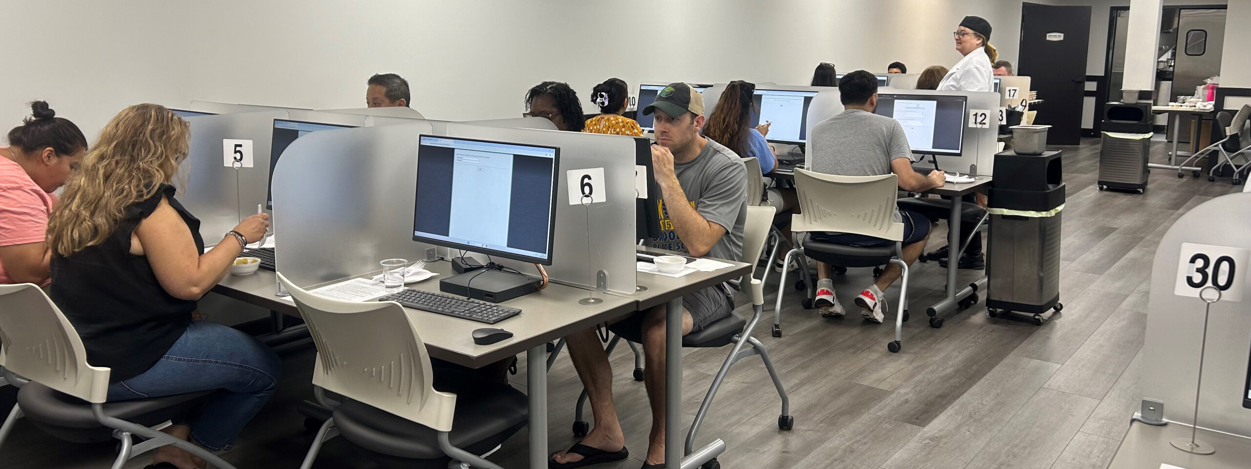 testing room at cec showing participants at computers